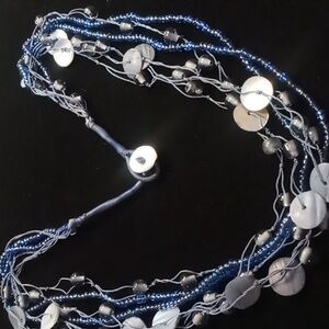 Boho blue shell necklace. Cobalt blue glass seed bead layered 24 inches long.